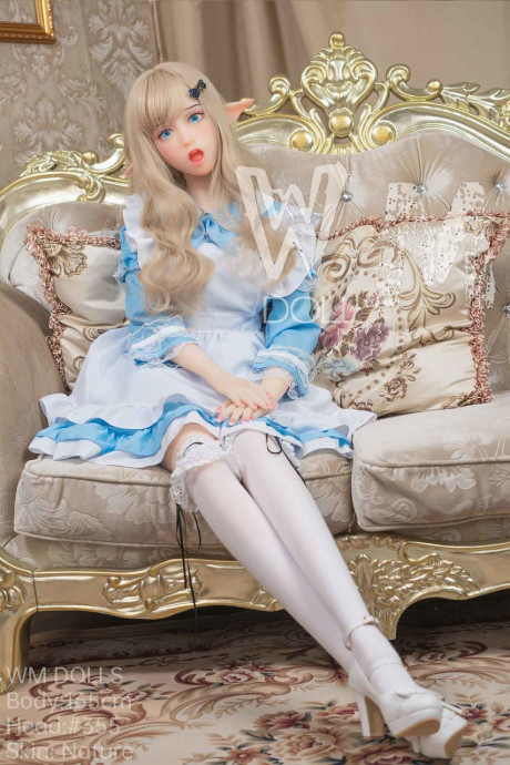 Pretty elf sex doll Hathorne posing in a fine yummy dress, leggings and heels