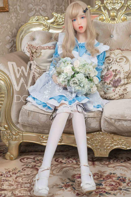 Pretty elf sex doll Hathorne posing in a fine yummy dress, leggings and heels