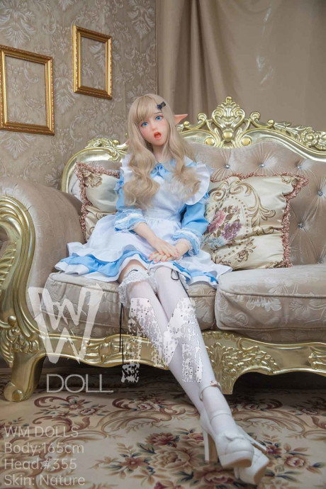 Pretty elf sex doll Hathorne posing in a fine yummy dress, leggings and heels