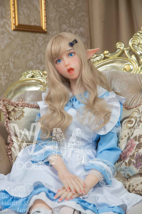 Pretty elf sex doll Hathorne posing in a fine yummy dress, leggings and heels