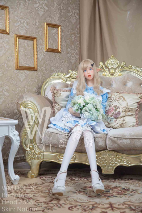 Pretty elf sex doll Hathorne posing in a fine yummy dress, leggings and heels