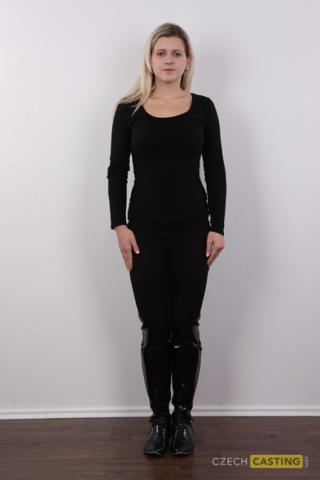 Naughty blondy Ester stands straight and narrow before her first nude appearance