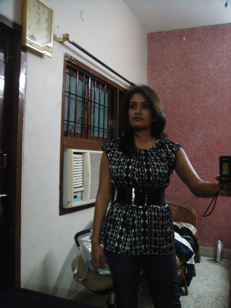Indian solo chick GF chick sucks on the nipples of her massive naturals during self shots