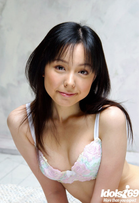 Foxy chinese babe Yui Hasumi stripping off her undergarment on the bed