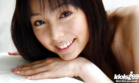 Foxy chinese babe Yui Hasumi stripping off her undergarment on the bed