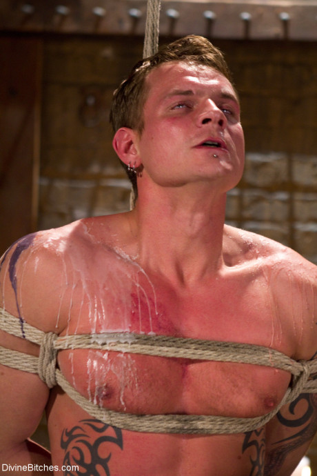 Fine femdom Bobbi Starr pours hot wax all over her tied up slave's chest