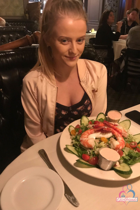 Amateur girlfriend Paris White sunbathing and showing her tits at the pool