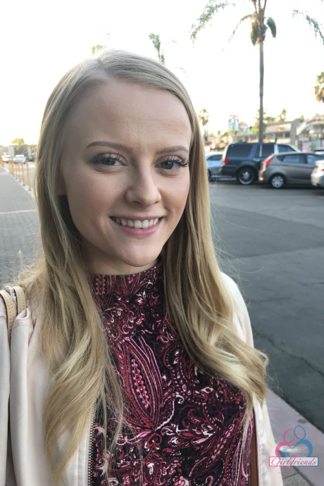 Amateur girlfriend Paris White sunbathing and showing her tits at the pool