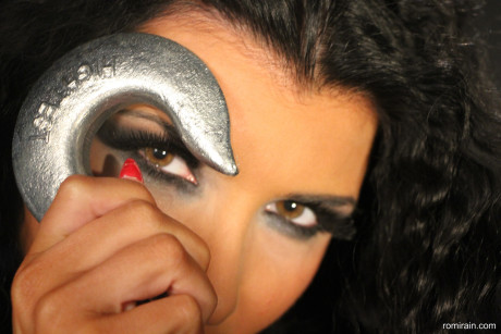 Gorgeous brunette Romi Rain shows off her enormous titties & spreads her shaved snatch