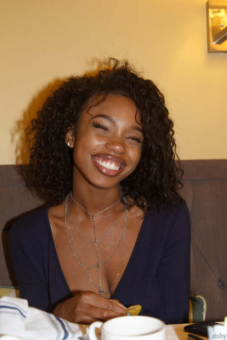 Curly haired sweetie Asia Amour flashing her natural tits and fabulous behind