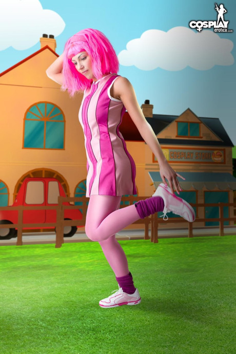 Adorable lady girlfriend woman with pink hair Lazy Town exposes her nice body on a lawn