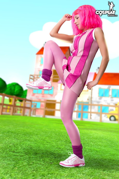 Adorable lady girlfriend woman with pink hair Lazy Town exposes her nice body on a lawn