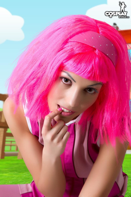 Adorable lady girlfriend woman with pink hair Lazy Town exposes her nice body on a lawn