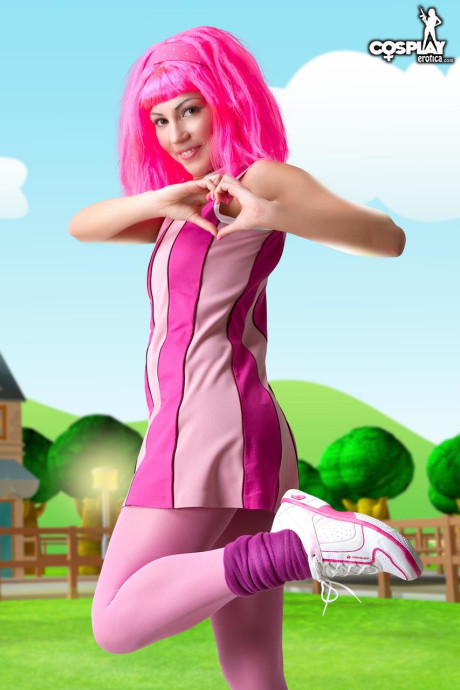 Adorable lady girlfriend woman with pink hair Lazy Town exposes her nice body on a lawn