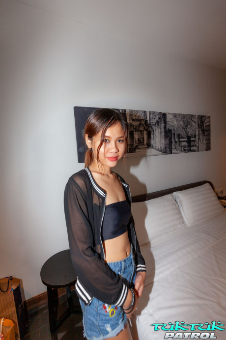 Thai schoolgirl Blue shows her curves before posing with sperm on her face