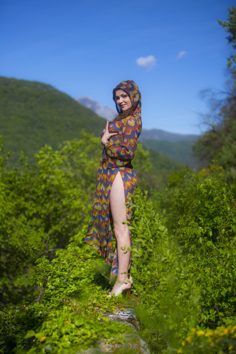 Sweet babe with giant melons spreads & fingers her tight pink cunt outdoors