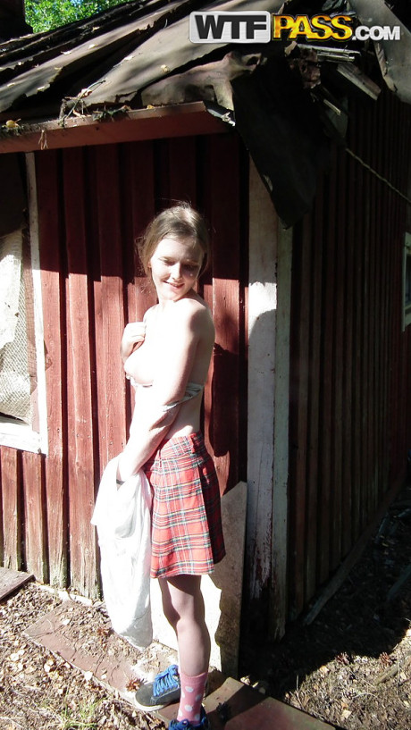 Solo chick girlfriend woman shows her melons and pussy while forcing entry into abandoned cabin