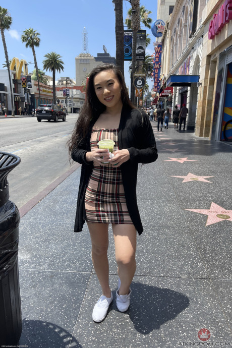 Asian young Kimmy Kimm doffs her clothes and flaunts her juicy twat