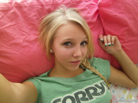 Attractive blonde young snaps self shots of her bareback breasts in cutoff jean shorts