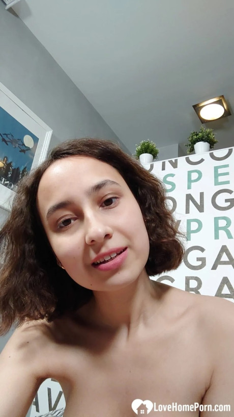 Pretty amateur showing off her great natural boobs in a solo