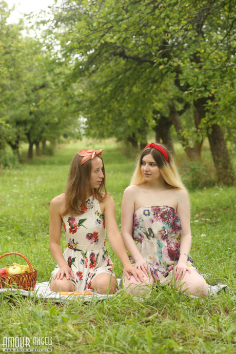 Two admirable teenie girlfriends expose their pretty lesbian nature getting nude
