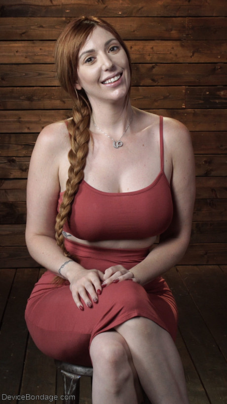 Voluptuous redheaded MILF Lauren Phillips gets tied up and toyed on a table