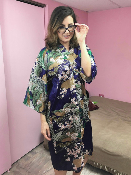 Gorgeous housewife Helena Price services her bushy cunt with a dildo