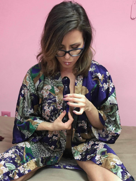 Gorgeous housewife Helena Price services her bushy cunt with a dildo