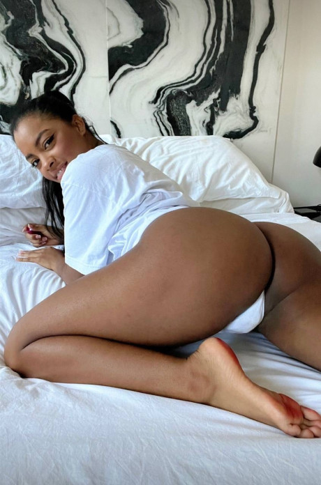 Fine amateur Sofi Vega exposes her thick butt and toys her juicy snatch