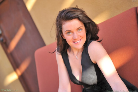 Adorable girl Brianne undresses and teases with her delicious snatch