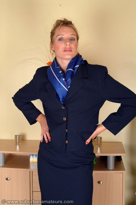 Lovely stewardess Angelina loses her uniform and spreads her hairy vagina
