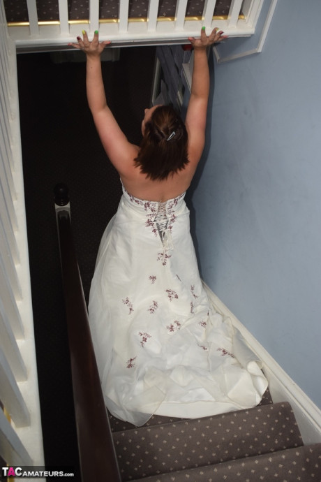 Amateur lady Sara Banks as her tits and cunt freed from a gown by two men