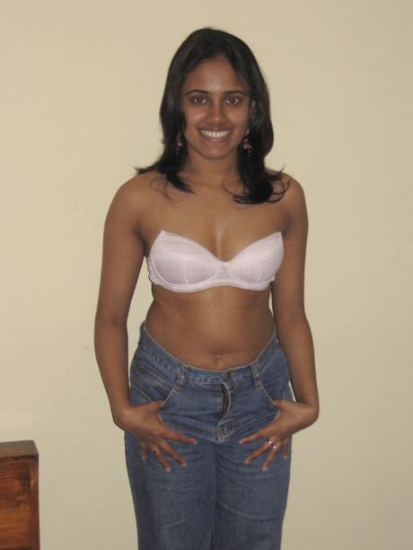 Indian solo girl girl chick exposes her melons while sporting a winning smile