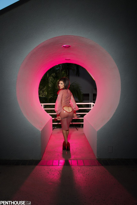 Fantastic pornstar babe Darcie Dolce teases with her gigantic melons after stripping