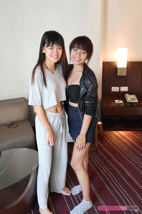 Skinny chinese amateurs Sprite and Mon strip and pose undressed together
