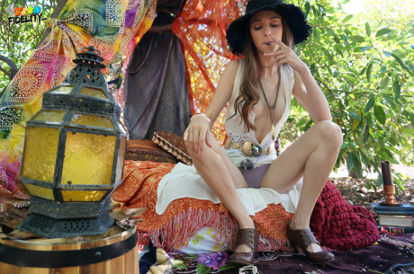 Hippy whore lady Willow Hayes bares her titties before smoking weed in the outdoors