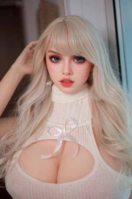 Hot blonde with striking eyes models in the nude and with her clothes on