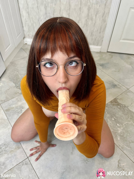 Solo bitch gf broad Ksenia masturbates with a dildo while wearing glasses and knee socks