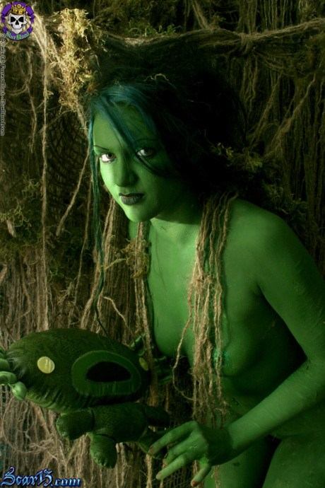 Solo bitch girl chick with green skin wanders around the woods with no clothes on