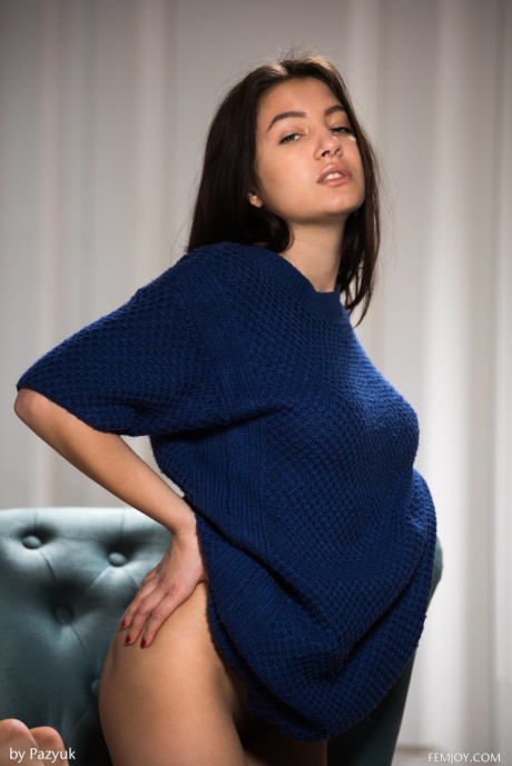 Attractive girl girl girl with nice titties Dora Z reveals her furry muff on a rocker