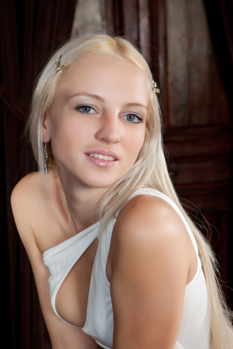 Pantyless teen Alysha A lifts her long dress and spreads her cunt