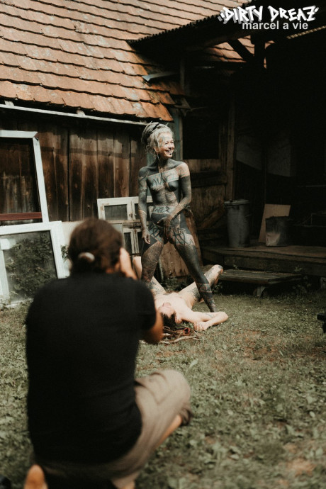Heavily tattooed hoes piss on a undressed fiance bf lover outside the back steps of a house