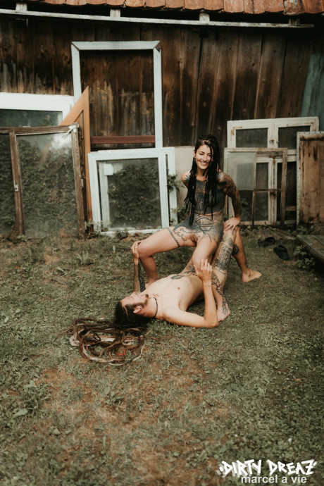 Heavily tattooed hoes piss on a undressed fiance bf lover outside the back steps of a house