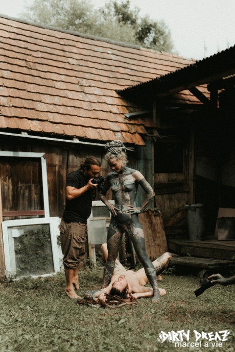Heavily tattooed hoes piss on a undressed fiance bf lover outside the back steps of a house