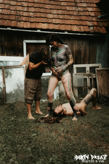 Heavily tattooed hoes piss on a undressed fiance bf lover outside the back steps of a house