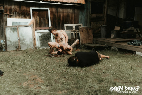 Heavily tattooed hoes piss on a undressed fiance bf lover outside the back steps of a house