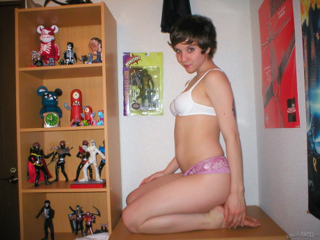 Pretty pretty short-haired schoolgirl surprises with nude pics taken by herself