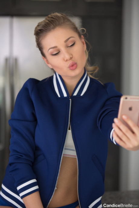 Ravishing fine ponytailed babe Candice Brielle exposes her pretty melons