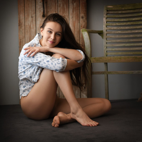 Brunette young Alisa Amore unveils her cute ttities and hot body on chair