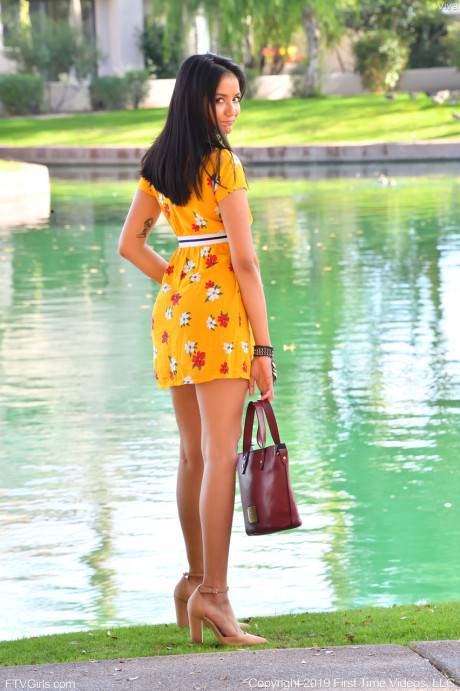 Babe Viva flashes her hot twat in public while posing in her summer dress